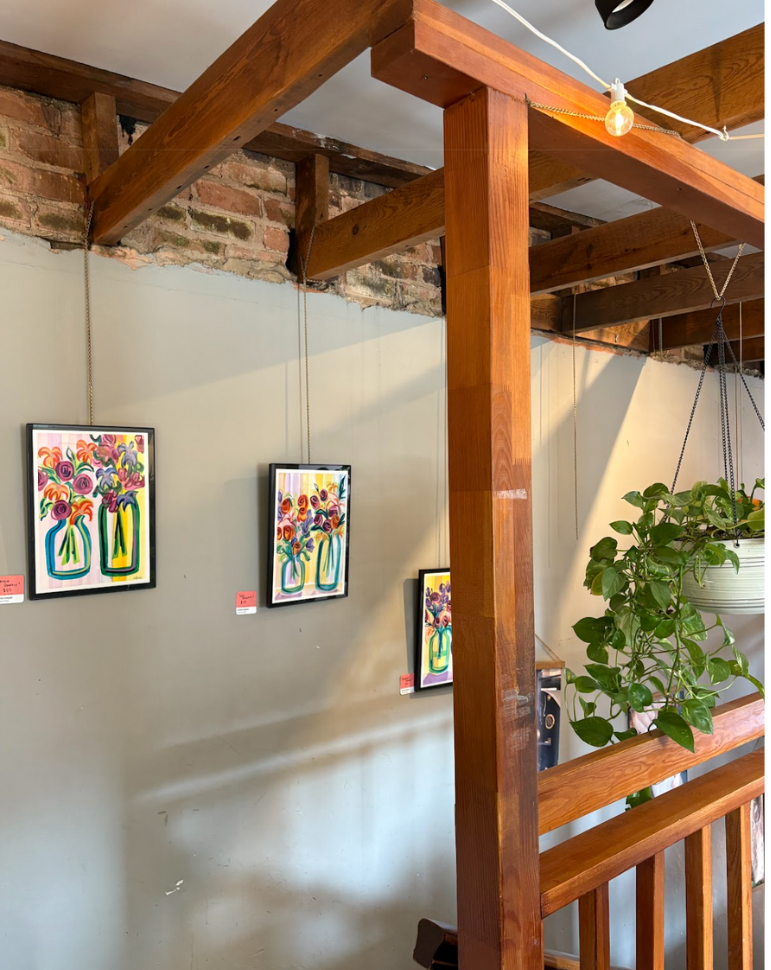 Annelise’s art hanging in Summit Basecamp