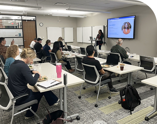 Attendees at a talk in the Hurt Hub event space