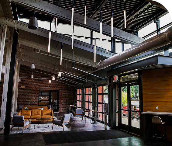 Open coworking lounge with sofas and natural light